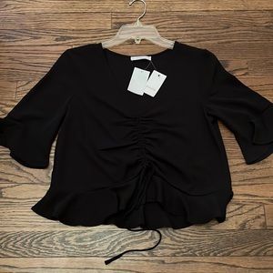 ELODIE Black shirred string top.